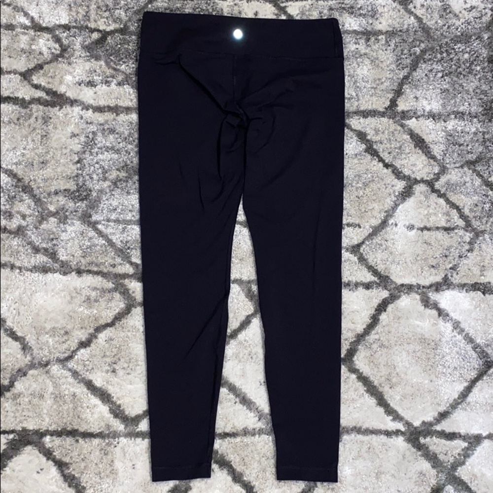 Lululemon Black wunder unders 24’ Size 12